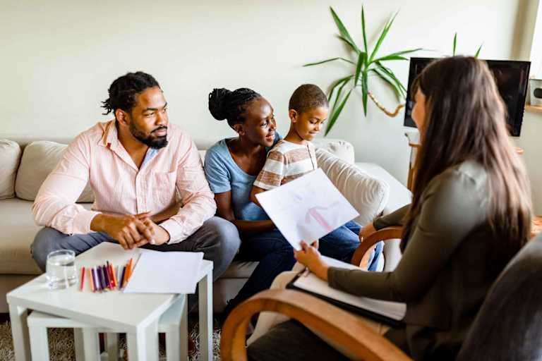 Counselor speaking to family