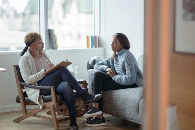 Therapist meeting with patient